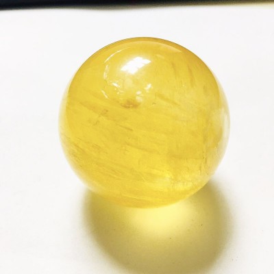 长期供应黄方解石水晶球 矿物标本办公摆件手把玩件客厅摆件原石